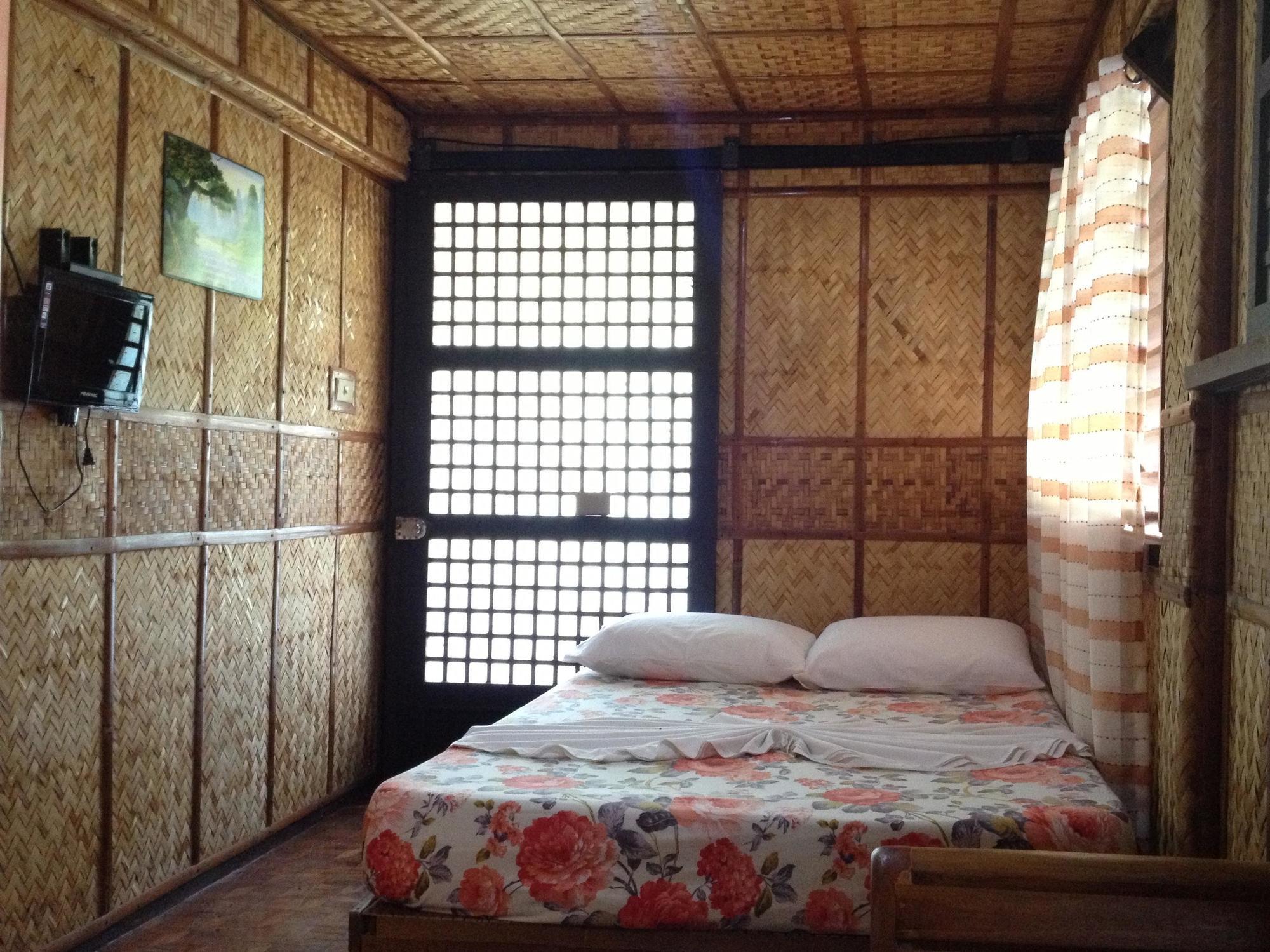 Bamboo House Beach Lodge & Restaurant Пуерто Галера Екстериор снимка